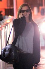 EMMA WATSON Arrives at JFK Airport in New York
