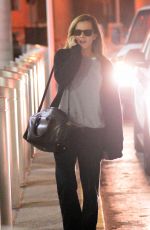 EMMA WATSON Arrives at JFK Airport in New York