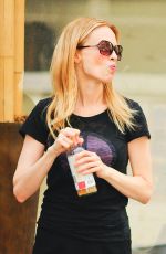HEATHER GRAHAM in Stockings and Shorts Out in New York