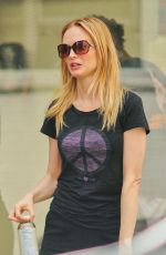 HEATHER GRAHAM in Stockings and Shorts Out in New York