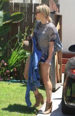 HILARY DUFF in Jeans Shorts at a Friends House in Hollywood