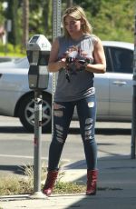 HILARY DUFF in TIght Ripped Jeans Out in Los Angeles