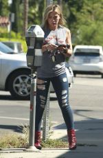 HILARY DUFF in TIght Ripped Jeans Out in Los Angeles