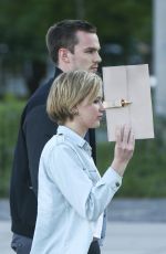 JENNIFER LAWRENCE and Nicholas Hoult Out and About in Cologne