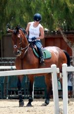 KALEY CUOCO Rides a Horse at a Ranch in Simi Valley