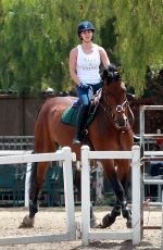 KALEY CUOCO Rides a Horse at a Ranch in Simi Valley