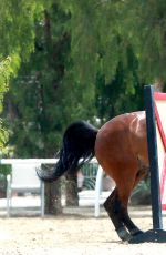 KALEY CUOCO Rides a Horse at a Ranch in Simi Valley