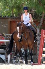 KALEY CUOCO Riding Her Horse in Los Angeles