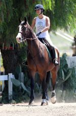 KALEY CUOCO Riding Her Horse in Los Angeles