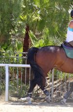 KALEY CUOCO Riding Her Horse in Los Angeles