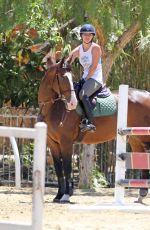 KALEY CUOCO Riding Her Horse in Los Angeles