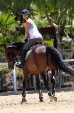 KALEY CUOCO Riding Her Horse in Los Angeles