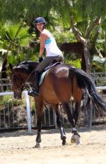 KALEY CUOCO Riding Her Horse in Los Angeles
