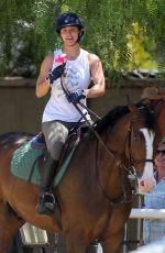 KALEY CUOCO Riding Her Horse in Los Angeles