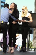 KAT DENNINGS and BETH BEHRS on the Set of Extra in Universal City