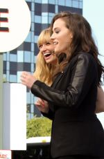 KAT DENNINGS and BETH BEHRS on the Set of Extra in Universal City