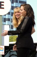 KAT DENNINGS and BETH BEHRS on the Set of Extra in Universal City