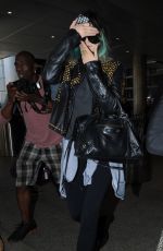 KENDALL and KYLIE JENNER at LAX Airport in Los Angeles