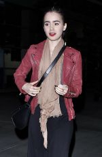 LILY COLLINS Arrives at a Movie Theatre in Hollywood