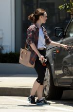 LILY COLLINS in Leggings Leaves a Gym in West Hollywood