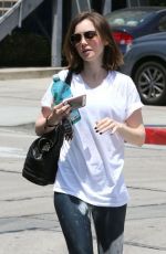 LILY COLLINS in Leggings Leaving a Gym in Hollywood