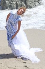 NICOLE SCHERZINGER in the Set of Her New Music Video at Malibu Beach
