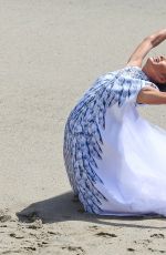 NICOLE SCHERZINGER in the Set of Her New Music Video at Malibu Beach