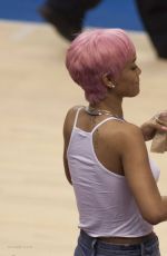 RIHANNA Shows Pink Hair at the Clippers Game in Los Angeles
