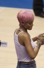RIHANNA Shows Pink Hair at the Clippers Game in Los Angeles