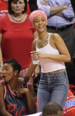 RIHANNA Shows Pink Hair at the Clippers Game in Los Angeles