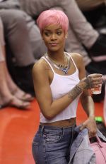 RIHANNA Shows Pink Hair at the Clippers Game in Los Angeles