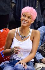RIHANNA Shows Pink Hair at the Clippers Game in Los Angeles