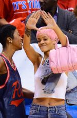 RIHANNA Shows Pink Hair at the Clippers Game in Los Angeles