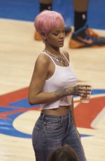 RIHANNA Shows Pink Hair at the Clippers Game in Los Angeles
