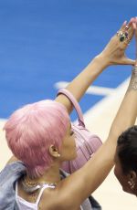RIHANNA Shows Pink Hair at the Clippers Game in Los Angeles
