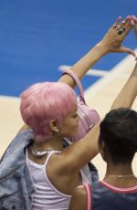 RIHANNA Shows Pink Hair at the Clippers Game in Los Angeles