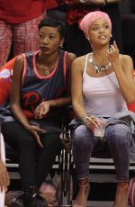RIHANNA Shows Pink Hair at the Clippers Game in Los Angeles