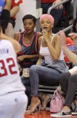 RIHANNA Shows Pink Hair at the Clippers Game in Los Angeles