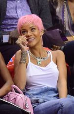 RIHANNA Shows Pink Hair at the Clippers Game in Los Angeles