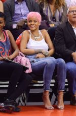 RIHANNA Shows Pink Hair at the Clippers Game in Los Angeles
