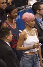 RIHANNA Shows Pink Hair at the Clippers Game in Los Angeles