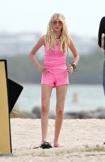 TAYLOR MOMSEN on the Set for a Music Video at a Beach in Miami