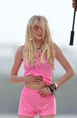 TAYLOR MOMSEN on the Set for a Music Video at a Beach in Miami