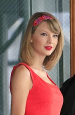 TAYLOR SWIFT in Red Dress Leaves Her Apartment in New York