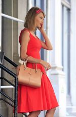 TAYLOR SWIFT in Red Dress Leaves Her Apartment in New York
