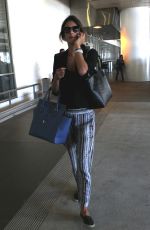 ALESSANDRA AMBROSIO Arriving at LAX 0306