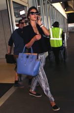 ALESSANDRA AMBROSIO Arriving at LAX 0306