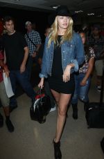 CANDICE SWANEPOEL Arrives at Los Angeles International Airport