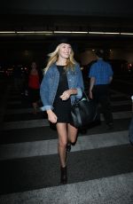 CANDICE SWANEPOEL Arrives at Los Angeles International Airport