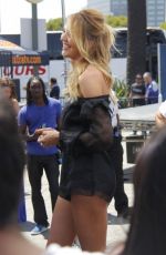 CANDICE SWANEPOEL on the Set of Extra in Universal City